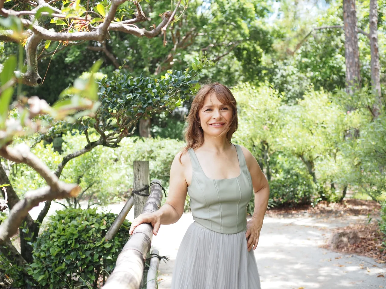 Coach Lil in a garden, personal trainer and body wisdom coach, Palm Beach, FL